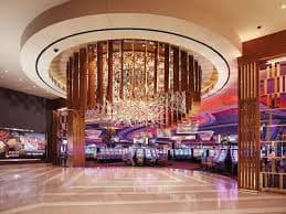 Filipino player spinning online slot game on smartphone at lvbet casino